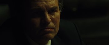 Movie still from “Dark Waters” (2019), directed by Todd Haynes – A person wearing a suit and tie; Close Up shot, Low angle