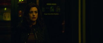 Movie still from “Dark Waters” (2019), directed by Todd Haynes – A woman standing in front of a wall; Medium shot, Over the shoulder angle