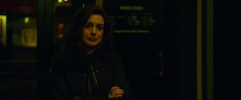 Movie still from “Dark Waters” (2019), directed by Todd Haynes – A woman in black jacket standing next to a wall; Close Up shot, Over the shoulder angle