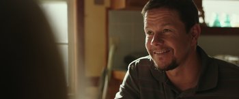 Movie still from “Deepwater Horizon” (2016), directed by Peter Berg – A person sitting in a room; Close Up shot, Over the shoulder angle