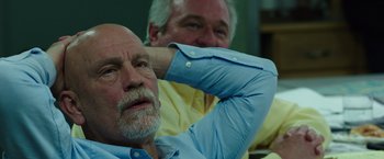 Movie still from “Deepwater Horizon” (2016), directed by Peter Berg – Two men sitting next to each other in a room; Close Up shot, Low angle