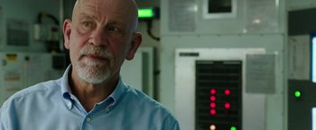 Movie still from “Deepwater Horizon” (2016), directed by Peter Berg – An older man in a blue dress shirt; Close Up shot, Over the shoulder angle