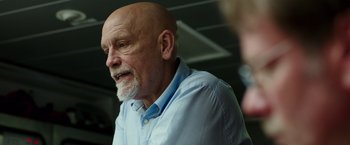 Movie still from “Deepwater Horizon” (2016), directed by Peter Berg – An older man with a beard and a white beard; Close Up shot, Low angle