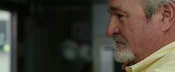 Movie still from “Deepwater Horizon” (2016), directed by Peter Berg – A person with a beard; Close Up shot, Low angle