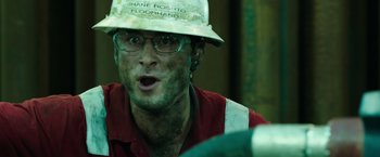 Movie still from “Deepwater Horizon” (2016), directed by Peter Berg – A person wearing a hard hat; Close Up shot, High angle