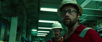 Movie still from “Deepwater Horizon” (2016), directed by Peter Berg – Two men in hard hats and glasses looking at the camera; Close Up shot, Low angle