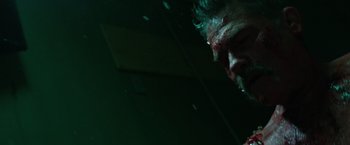 Movie still from “Deepwater Horizon” (2016), directed by Peter Berg – A person with blood on his face; Close Up shot, Low angle
