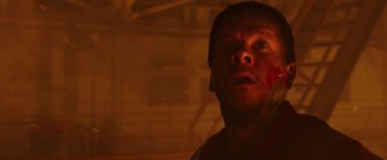 Movie still from “Deepwater Horizon” (2016), directed by Peter Berg – A person with blood on his face; Close Up shot, Low angle