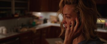 Movie still from “Deepwater Horizon” (2016), directed by Peter Berg – A person talking on a cell phone; Close Up shot, High angle