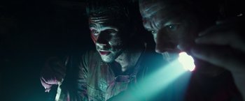 Movie still from “Deepwater Horizon” (2016), directed by Peter Berg – A man with a beard is looking at a light; Close Up shot, Low angle