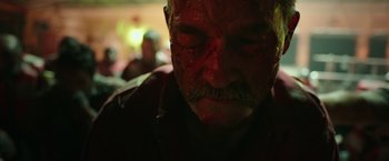 Movie still from “Deepwater Horizon” (2016), directed by Peter Berg – A person with blood all over his face; Close Up shot, Low angle