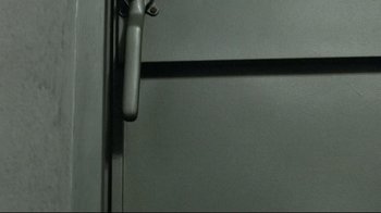 Movie still from “Downfall” (2004), directed by Oliver Hirschbiegel – View of the handle of a refrigerator; Extreme Close Up shot, Low angle