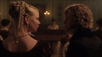 Movie still from “Emma.” (2020), directed by Autumn de Wilde – A man and a woman are looking at one another; Close Up shot, Over the shoulder angle