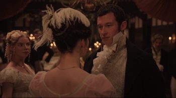 Movie still from “Emma.” (2020), directed by Autumn de Wilde – A man and a woman dressed in period garb; Close Up shot, Over the shoulder angle