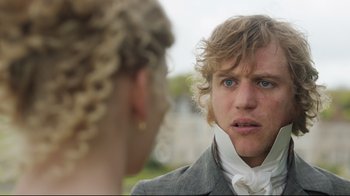 Movie still from “Emma.” (2020), directed by Autumn de Wilde – A man and a woman are talking to each other; Close Up shot, Over the shoulder angle