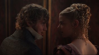 Movie still from “Emma.” (2020), directed by Autumn de Wilde – A man and a woman face to face in front of a wall; Close Up shot, Over the shoulder angle