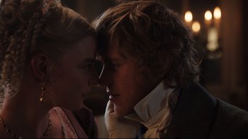Movie still from “Emma.” (2020), directed by Autumn de Wilde – A man and a woman standing next to each other; Close Up shot, Over the shoulder angle