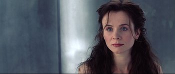 Movie still from “Equilibrium” (2002), directed by Kurt Wimmer – A person with long hair; Close Up shot, Over the shoulder angle