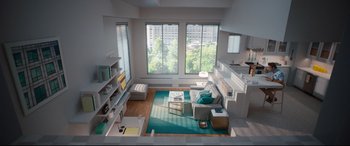 Movie still from “Free Guy” (2021), directed by Shawn Levy – An overhead view of a living room with a blue rug; Extreme Wide shot, High angle