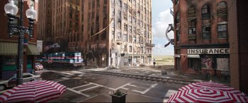 Movie still from “Free Guy” (2021), directed by Shawn Levy – A painting of a city street with a building in the background; Extreme Wide shot, High angle