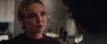 Movie still from “Free Guy” (2021), directed by Shawn Levy – A person looking at the camera; Close Up shot, Over the shoulder angle