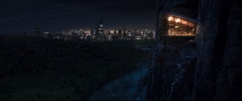 Movie still from “Free Guy” (2021), directed by Shawn Levy – A view of a city at night from a cliff; Extreme Wide shot, High angle
