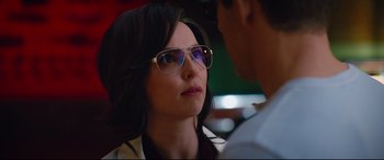 Movie still from “Free Guy” (2021), directed by Shawn Levy – A woman wearing a pair of glasses looking at a man; Close Up shot, Over the shoulder angle