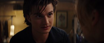 Movie still from “Free Guy” (2021), directed by Shawn Levy – A person wearing a black shirt; Close Up shot, Over the shoulder angle