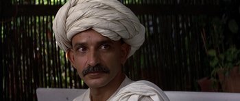Movie still from “Gandhi” (1982), directed by Richard Attenborough – A person wearing a turban; Close Up shot, Low angle