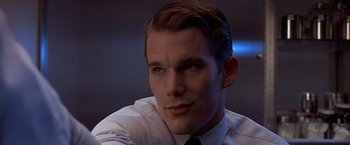 Movie still from “Gattaca” (1997), directed by Andrew Niccol – A person wearing a shirt and tie; Close Up shot, Low angle