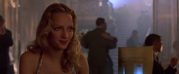 Movie still from “Gattaca” (1997), directed by Andrew Niccol – A beautiful blonde woman in a white dress; Close Up shot, Over the shoulder angle