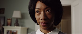 Movie still from “Get Out” (2017), directed by Jordan Peele – A woman's eyes and face; Close Up shot, Over the shoulder angle