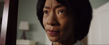 Movie still from “Get Out” (2017), directed by Jordan Peele – A woman's eyes and face; Close Up shot, Low angle