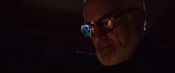 Movie still from “Get Out” (2017), directed by Jordan Peele – A person wearing glasses; Close Up shot, Low angle