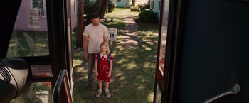 Movie still from “Gifted” (2017), directed by Marc Webb – A man standing next to a little girl; Wide shot, High angle
