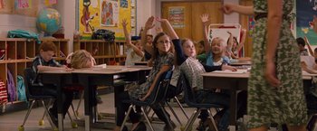 Movie still from “Gifted” (2017), directed by Marc Webb – A group of children raising their hands in a classroom; Medium shot, High angle