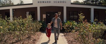 Movie still from “Gifted” (2017), directed by Marc Webb – A man and a little girl walking down a sidewalk; Wide shot, Low angle