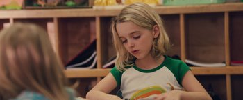 Movie still from “Gifted” (2017), directed by Marc Webb – A young girl sitting in front of a bookshelf; Close Up shot, Over the shoulder angle