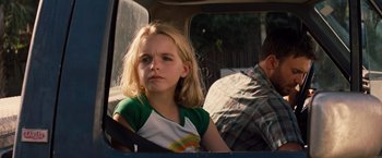 Movie still from “Gifted” (2017), directed by Marc Webb – A girl sitting in the back seat of a car; Close Up shot, Over the shoulder angle