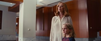 Movie still from “Gifted” (2017), directed by Marc Webb – A woman standing next to a young girl; Medium shot, Low angle