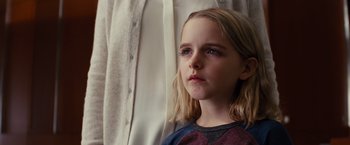 Movie still from “Gifted” (2017), directed by Marc Webb – A young girl with long blonde hair and blue eyes; Close Up shot, Over the shoulder angle