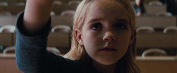 Movie still from “Gifted” (2017), directed by Marc Webb – A person with long hair; Close Up shot, High angle