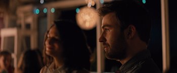 Movie still from “Gifted” (2017), directed by Marc Webb – A man and a woman are looking at something; Close Up shot, Over the shoulder angle