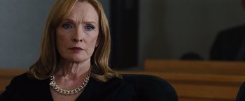 Movie still from “Gifted” (2017), directed by Marc Webb – A person sitting on a chair; Close Up shot, Low angle