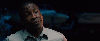 Movie still from “Gifted” (2017), directed by Marc Webb – A man in a white shirt and a tie; Close Up shot, Low angle