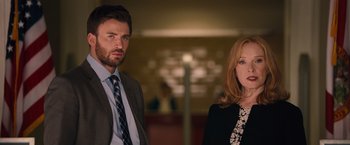 Movie still from “Gifted” (2017), directed by Marc Webb – A man and a woman standing next to each other; Medium shot, Low angle