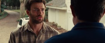 Movie still from “Gifted” (2017), directed by Marc Webb – A man in a plaid shirt talking to another man; Close Up shot, Over the shoulder angle