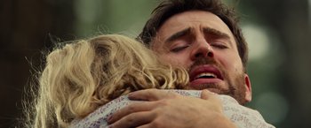 Movie still from “Gifted” (2017), directed by Marc Webb – A person hugging a person; Extreme Close Up shot, Low angle