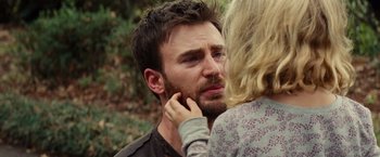 Movie still from “Gifted” (2017), directed by Marc Webb – A man with a goatee is looking at a woman; Close Up shot, Over the shoulder angle