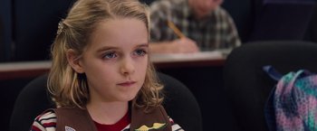 Movie still from “Gifted” (2017), directed by Marc Webb – A young girl sitting in front of a man; Close Up shot, High angle